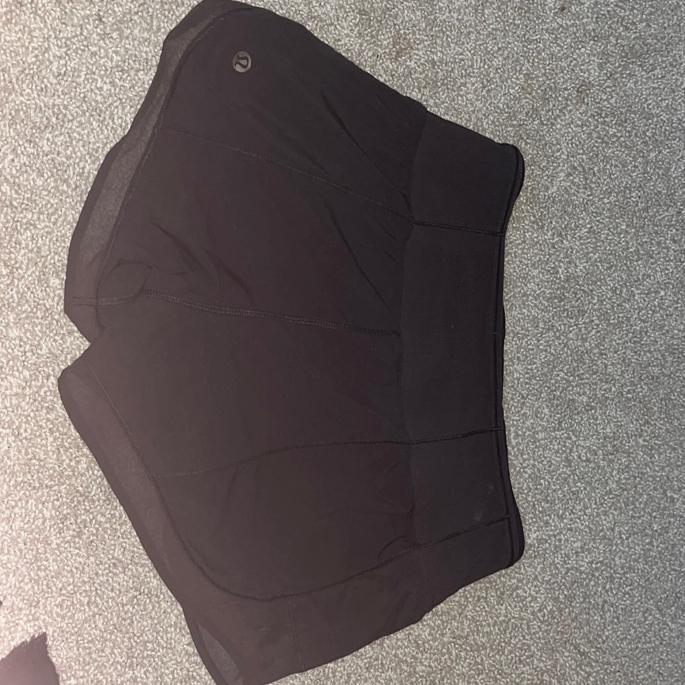 LULU LEMON SHORTS. zip up pocket and mesh waist band pocket.